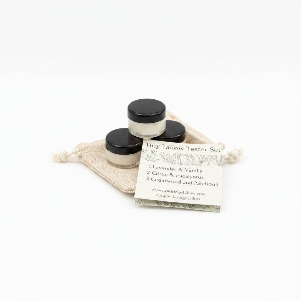 Tin Tallow Tester Set with three small containers and a business card on a reflective surface.